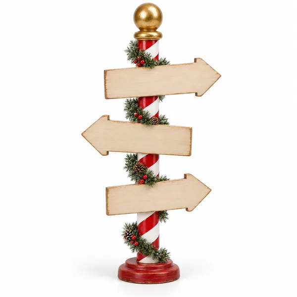 A candy striped North Pole post with three blank wooden arrow signs